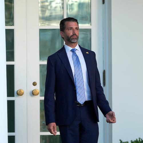 Donald Trump Jr. stands near the Oval Office after a ceremony to present the Presidential Medal of Freedom for Charlie Kirk to his widow Erika Kirk in the Rose Garden of the White House, Tuesday, Oct. 14, 2025, in Washington. (AP Photo/Mark Schiefelbein)