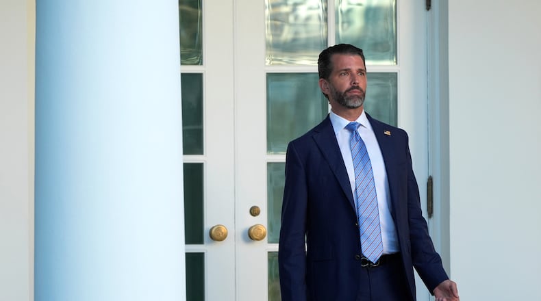 Donald Trump Jr. stands near the Oval Office after a ceremony to present the Presidential Medal of Freedom for Charlie Kirk to his widow Erika Kirk in the Rose Garden of the White House, Tuesday, Oct. 14, 2025, in Washington. (AP Photo/Mark Schiefelbein)