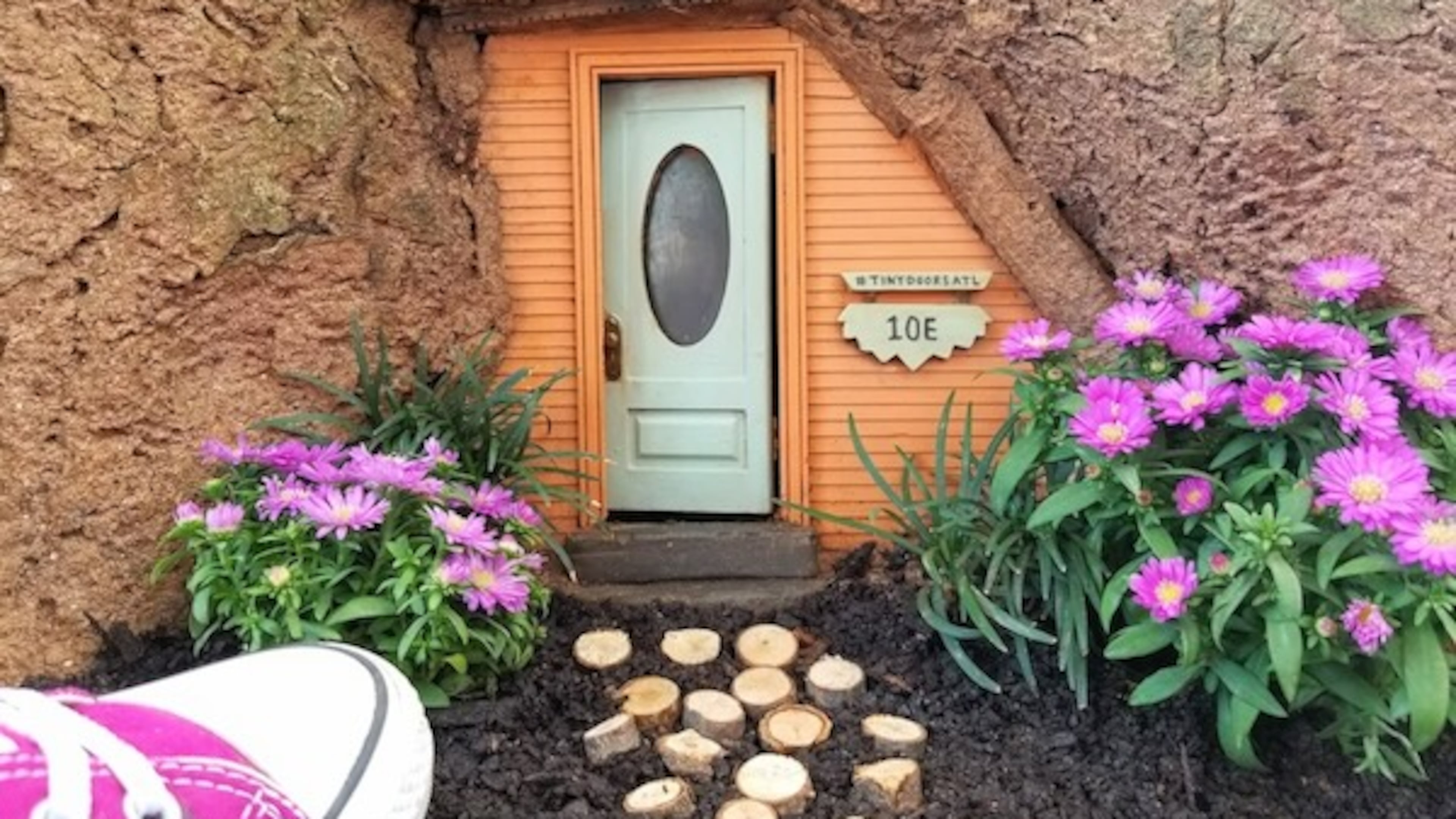 Tiny Doors ATL has installed mini-entryways all over Atlanta, including this one on the Grant Park Trail (suggestion: park nearby in the Gateway garage). (Courtesy of Tiny Doors ATL)