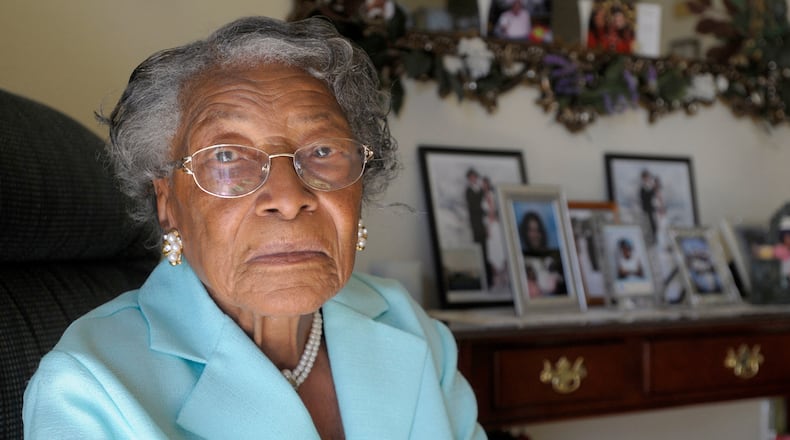 FILE - In this Oct. 7, 2010, file photo, Recy Taylor, now 91, sits in her home in Winter Haven, Fla. Oprah Winfreys barnstormer of a speech at the Golden Globes highlighted the story of Taylor, a black Alabama woman who was raped by six white men in 1944. Winfrey told the audience that Taylor was a name they should know. (AP Photo/Phelan M. Ebenhack, File)