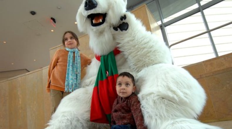 Hug a 7-foot-tall polar bear at the World of Coca-Cola.