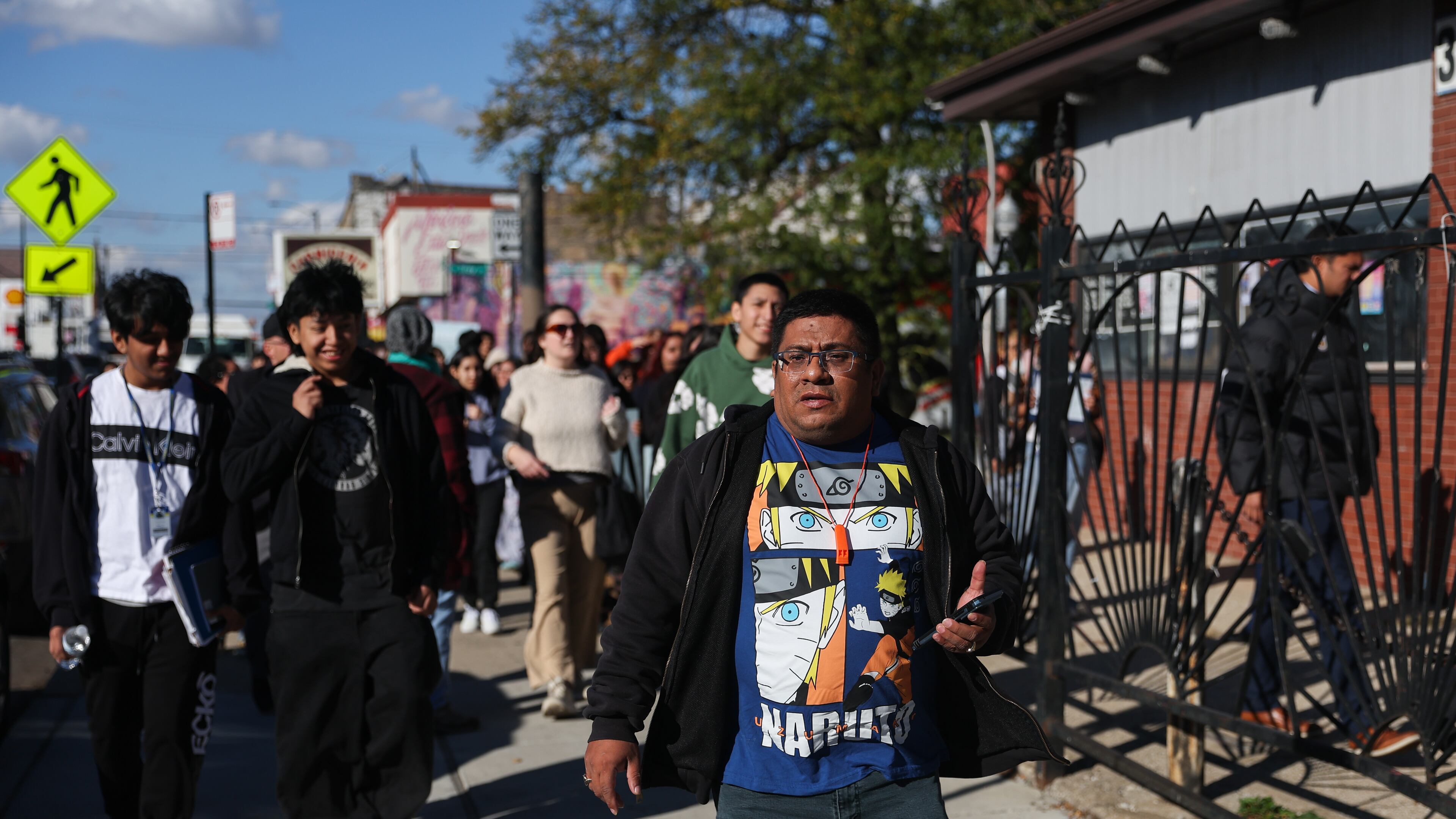 Baltazar Enriquez, president of the Little Village Community Council, walks with a Chicago Public School's student walkout in protest against U.S. Immigration and Customs Enforcement (ICE) agents around Chicago's Little Village neighborhood, Wednesday, Oct. 29, 2025. (AP Photo/Talia Sprague)