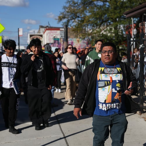 Baltazar Enriquez, president of the Little Village Community Council, walks with a Chicago Public School's student walkout in protest against U.S. Immigration and Customs Enforcement (ICE) agents around Chicago's Little Village neighborhood, Wednesday, Oct. 29, 2025. (AP Photo/Talia Sprague)