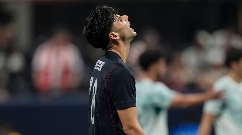 USA's Max Arfsten (18) reacts to losing against Portugal during the second half of an international friendly soccer match, Tuesday, March 31, 2026, in Atlanta. (AP Photo/Mike Stewart)