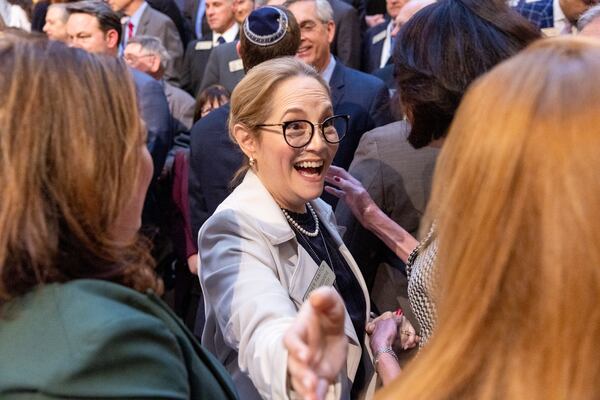 Rep. Esther Panitch, D-Sandy Springs, greets supporters before Gov. Brian Kemp signs antisemitism bill HB 30 at the Capitol in Atlanta on Wednesday, January 31, 2024. Patnitch is the only Jewish member of the Georgia General Assembly. (Arvin Temkar/arvin.temkar@ajc.com)