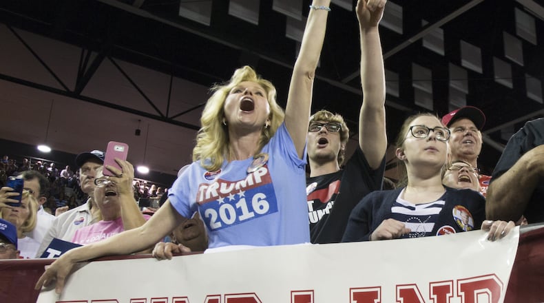 Maree Miller, of Cairo, Ga., reacts to Republican presidential candidate Donald Trump as he speaks to supporters during a rally at Valdosta State University on Monday. Mark Wallheiser/Getty Images