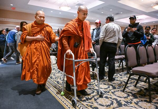 Buddhist monk Bhante Dam Phommasan says he used breathing and meditation techniques to get through the worst of the pain. 