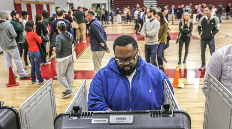 Ten candidates have qualified to run for City Council Posts 2, 4 and 6 in Johns Creek. AJC FILE / JOHN SPINK