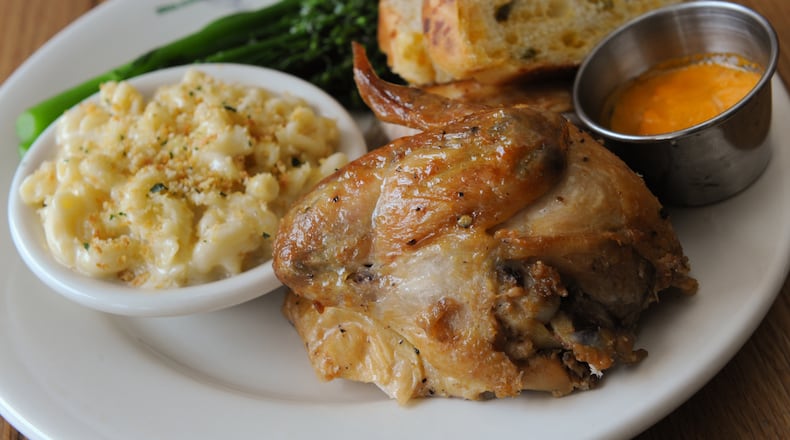 1/4 Carolina Chicken with sauteed broccolini and garlic, aged cheddar mac & cheese and jalapeno cheddar bread at Bantam & Biddy. (Contributed by Becky Stein)