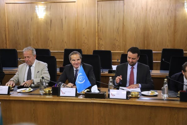 In this photo, released by the Atomic Energy Organisation of Iran, International Atomic Energy Agency (IAEA) Director General, Rafael Mariano Grossi, center, attends a meeting with head of the Atomic Energy Organization of Iran Mohammad Eslami, in Tehran, Iran, Thursday, April 17, 2025. (Atomic Energy Organisation of Iran via AP)