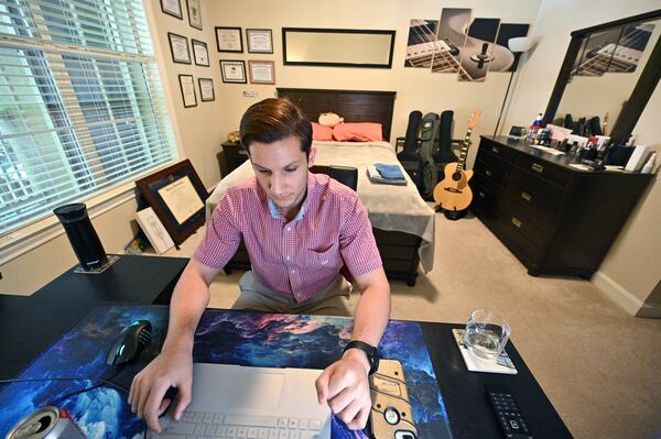 Abdallah Al-Obaidi, who is an Emory student and an Iraqi refugee, participates in a Zoom meeting with a film crew about his journey to the U.S. and finding his voice in the process at his apartment in Decatur on Thursday, June 17, 2021. (Hyosub Shin / Hyosub.Shin@ajc.com)