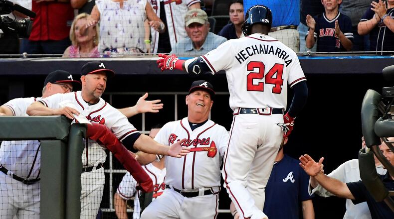 Adeiny Hechavarria of the Atlanta Braves celebrates hitting a 2-run home run in the second inning against the Miami Marlins at SunTrust Park on August 21, 2019 in Atlanta, Georgia. (Photo by Logan Riely/Getty Images)