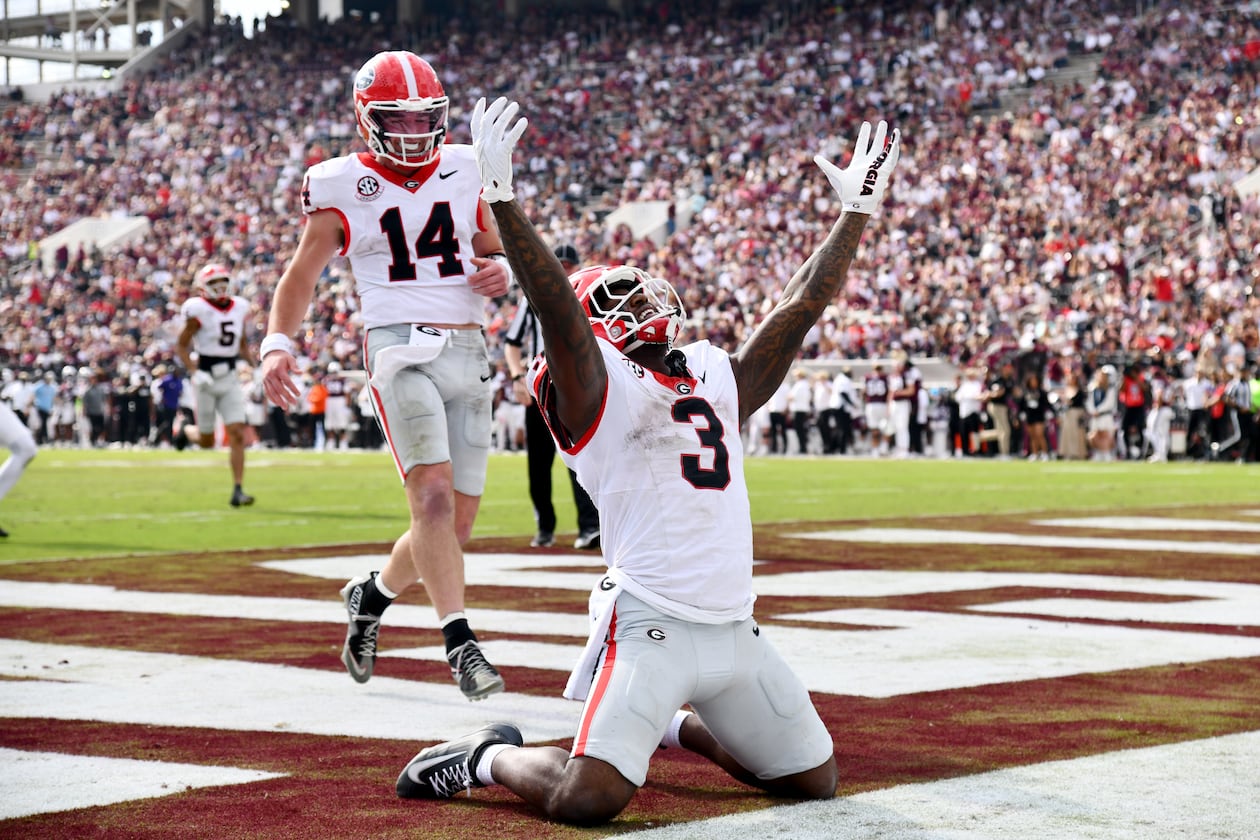 Georgia running back Nate Frazier celebrates after scoring a touchdown during the second half at Davis Wade Stadium on Saturday, Nov. 8, 2025, in Starkville, Miss. There has been speculation that Texas Tech could pass Georgia in the College Football Playoff rankings. (Hyosub Shin/AJC)
