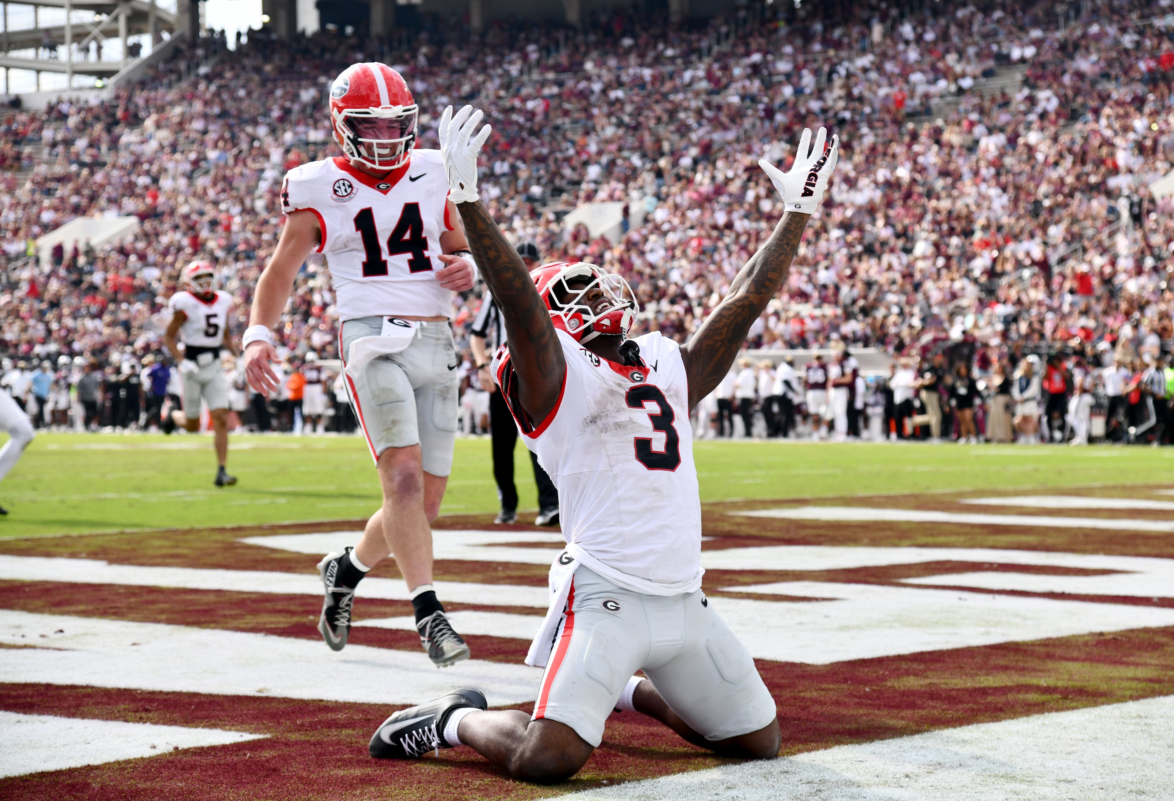 Georgia running back Nate Frazier (3) celebrates after scoring a touchdown during the second half in an NCAA football game at Davis Wade Stadium, Saturday, November 8, 2025, in Starkville, Mississippi. Georgia won 41-21 over Mississippi State. (Hyosub Shin / AJC)