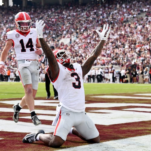 Georgia running back Nate Frazier celebrates after scoring a touchdown during the second half at Davis Wade Stadium on Saturday, Nov. 8, 2025, in Starkville, Miss. There has been speculation that Texas Tech could pass Georgia in the College Football Playoff rankings. (Hyosub Shin/AJC)