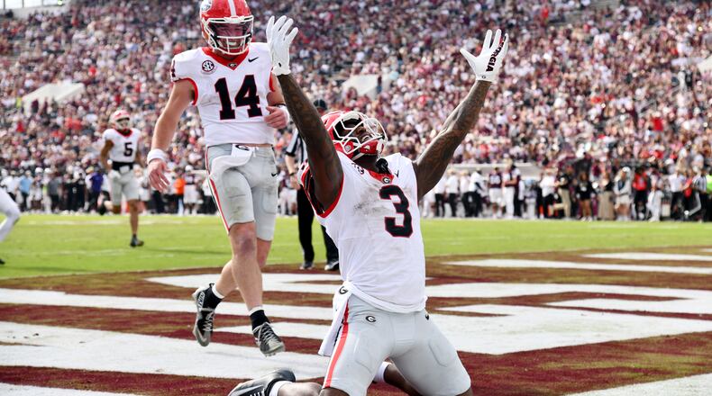 Georgia running back Nate Frazier celebrates after scoring a touchdown during the second half at Davis Wade Stadium on Saturday, Nov. 8, 2025, in Starkville, Miss. There has been speculation that Texas Tech could pass Georgia in the College Football Playoff rankings. (Hyosub Shin/AJC)