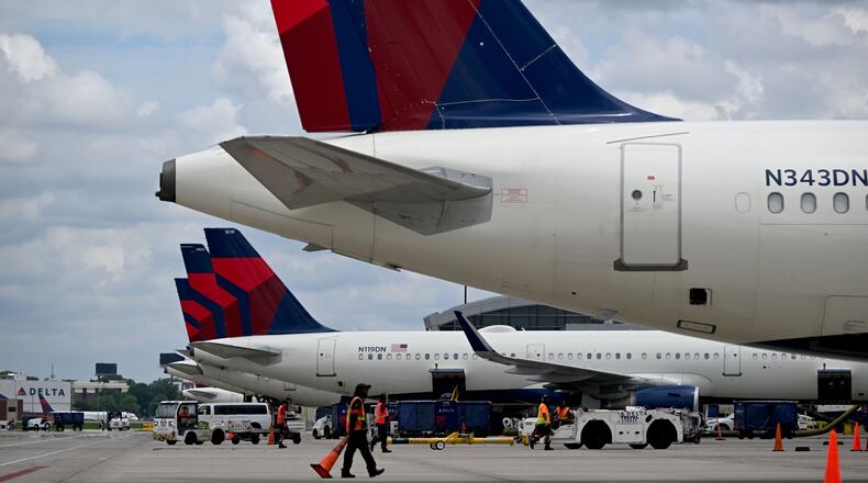 Delta airplanes prepare for takeoff from Hartsfield-Jackson Atlanta International Airport on Thursday, May 28, 2026. Airlines have been increasing fares as demand for travel continues. (Hyosub Shin/AJC)