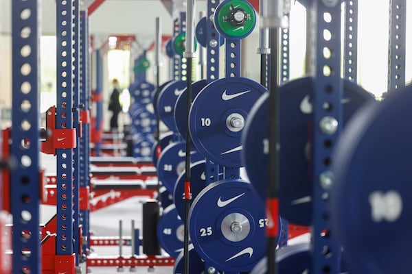Strength training plays a key role in supporting joints and maintaining bone density while exercising or preparing for events like the Peachtree Road Race. (Arvin Temkar/AJC)