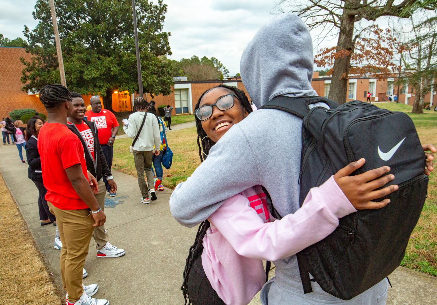 DeKalb County school hugs students every Wednesday on the way in to class