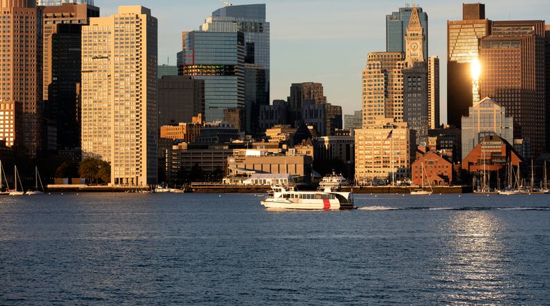 FILE - The Boston harbor and the city skyline are photographed, Oct. 28, 2022, in Boston. (AP Photo/Michael Dwyer, File)