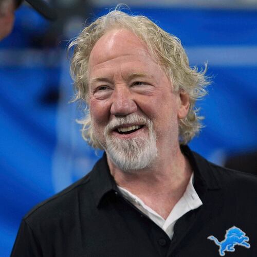 FILE - Actor Timothy Busfield smiles before an NFL football game in Detroit, Sept. 14, 2025. (AP Photo/Paul Sancya, File)