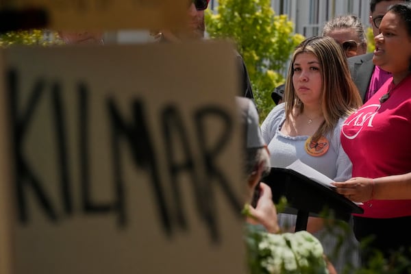 Jennifer Vasquez Sura, wife of Kilmar Abrego Garcia, second right, attends a news conference outside the federal courthouse Wednesday, July 16, 2025, in Nashville, Tenn. (AP Photo/George Walker IV)