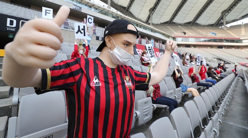 Mannequins are installed at the empty spectators' seats before the start of a soccer match between FC Seoul and Gwangju FC May 17, 2020, at the Seoul World Cup Stadium in Seoul, South Korea.