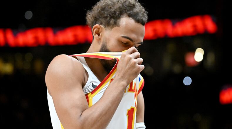 Atlanta Hawks guard Trae Young takes a moment before a preseason NBA basketball game at State Farm Arena, Thursday, Oct. 16, 2025. (Hyosub Shin/AJC)