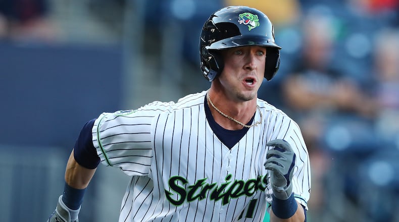 Gwinnett Stripers outfielder Drew Waters runs the first base line hitting a lead off double against the Memphis Redbirds during the first inning of a MLB minor league game on Tuesday, May 17, 2022, in Lawrenceville.    “Curtis Compton / Curtis.Compton@ajc.com”