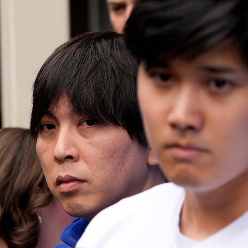 FILE - Ippei Mizuhara, left, stands next to Los Angeles Dodgers player Shohei Ohtani, right, during an interview at Dodger Stadium, Feb. 3, 2024. (AP Photo/Richard Vogel, File)