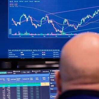 Specialist John Parisi works at his post on the floor of the New York Stock Exchange, Wednesday, April 22, 2026. (AP Photo/Richard Drew)