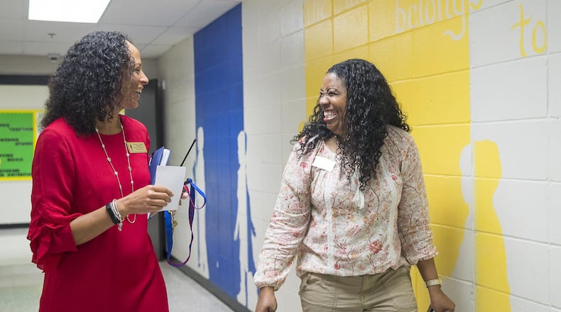 Principal Pam Williams (left) talks with first-grade teacher Tavane Glass as they walk the hallways at Bethesda Elementary School in Lawrenceville, Wednesday, April 10, 2019. ALYSSA POINTER/ALYSSA.POINTER@AJC.COM