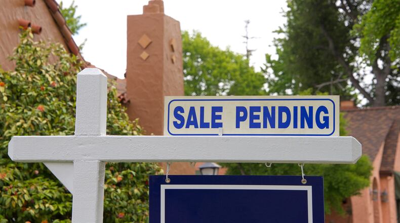It may not be the frenzy of previous years, but late spring is the peak of the housing market, the time when the most homes are listed for sale and the largest number of people looking to buy. (Sheila Fitzgerald/Dreamstime/TNS)