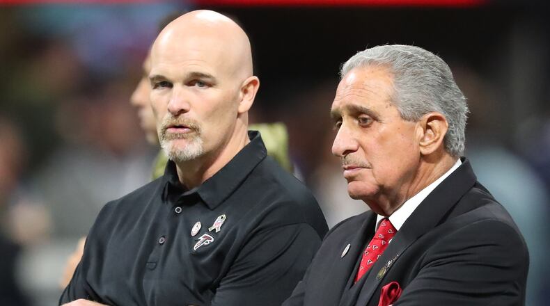November 12, 2017 Atlanta : Falcons head coach Dan Quinn and owner Arthur Blank confer before playing the Cowboys in a NFL football game on Sunday, November 12, 2017, in Atlanta.    Curtis Compton/ccompton@ajc.com
