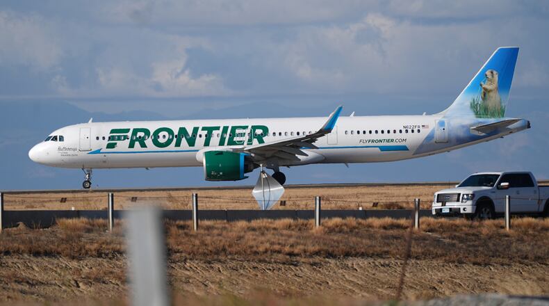 FILE - A Frontier Airlines jetliner taxis down a runway for take off from Denver International airport on Nov. 25, 2025, in Denver. (AP Photo/David Zalubowski, File)