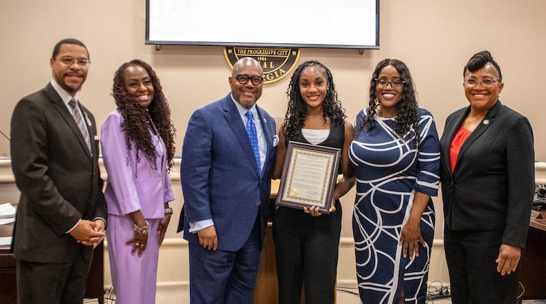 Braxton Smith was honored for her public speaking accomplishments and placing third in Optimist International’s GATEway District Contest in April. Pictured are Union City Councilman Brian K. Jones, Councilwoman Lawanna Owens-Twaites, Mayor Vince Williams, Braxton Smith, Councilwoman Angelette Mealing and Councilwoman Christina Hobbs. Courtesy City of Union City