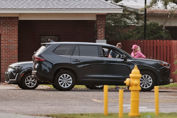 Savannah Chrisley, daughter of reality television star Todd Chrisley, waits for the release of her father at the Federal Prison Camp, Wednesday, May 28, 2025, in Pensacola, Fla. (AP Photo/Dan Anderson)