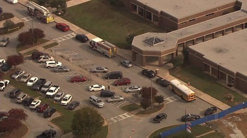 Four Henry County high school students were rushed to the hospital Friday morning after ingesting some sort of substance on campus, school officials said.