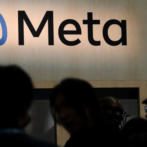 FILE - Attendees visit the Meta booth at the Game Developers Conference 2023 in San Francisco on March 22, 2023. (AP Photo/Jeff Chiu, File)