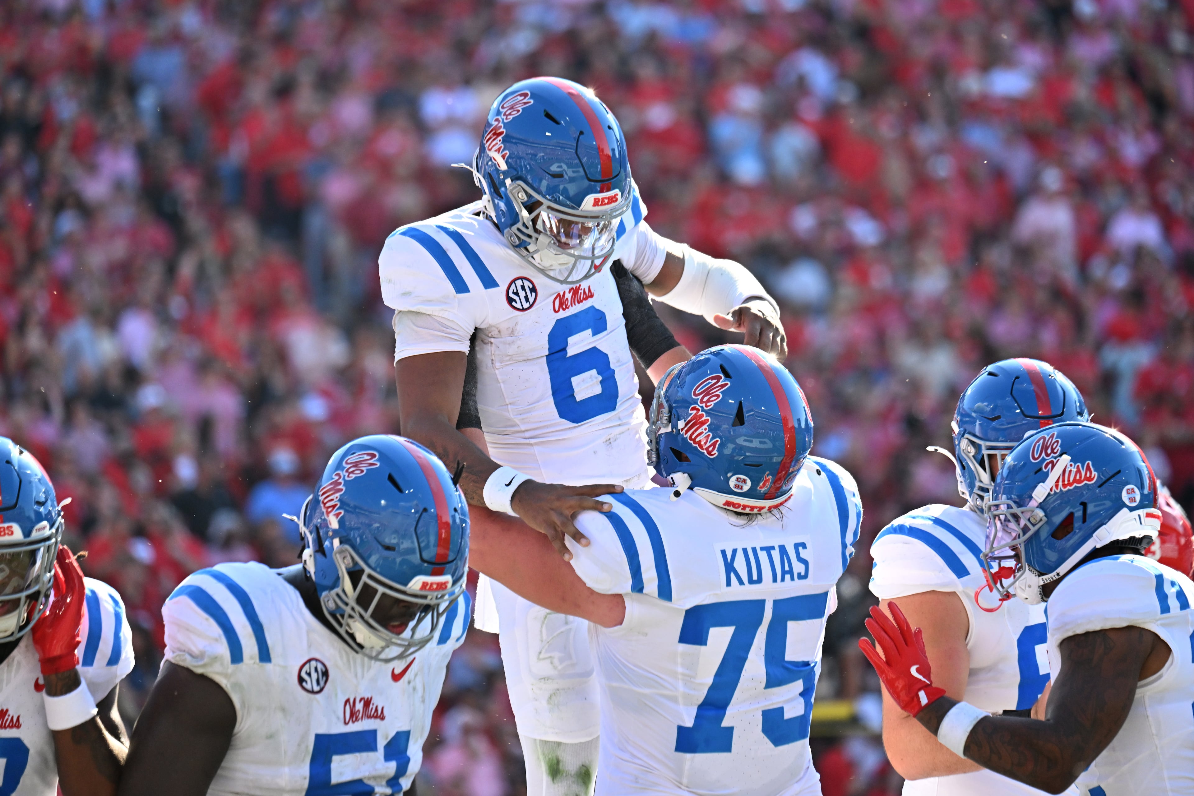 Mississippi quarterback Trinidad Chambliss (6) celebrates after scoring a touchdown during the first half in an NCAA football game at Sanford Stadium, Saturday, October 18, 2025, in Athens. (Hyosub Shin / AJC)