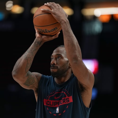 FILE - Los Angeles Clippers forward Kawhi Leonard warms up before an NBA basketball game April 10, 2026, in Portland, Ore. (AP Photo/Jenny Kane, File)