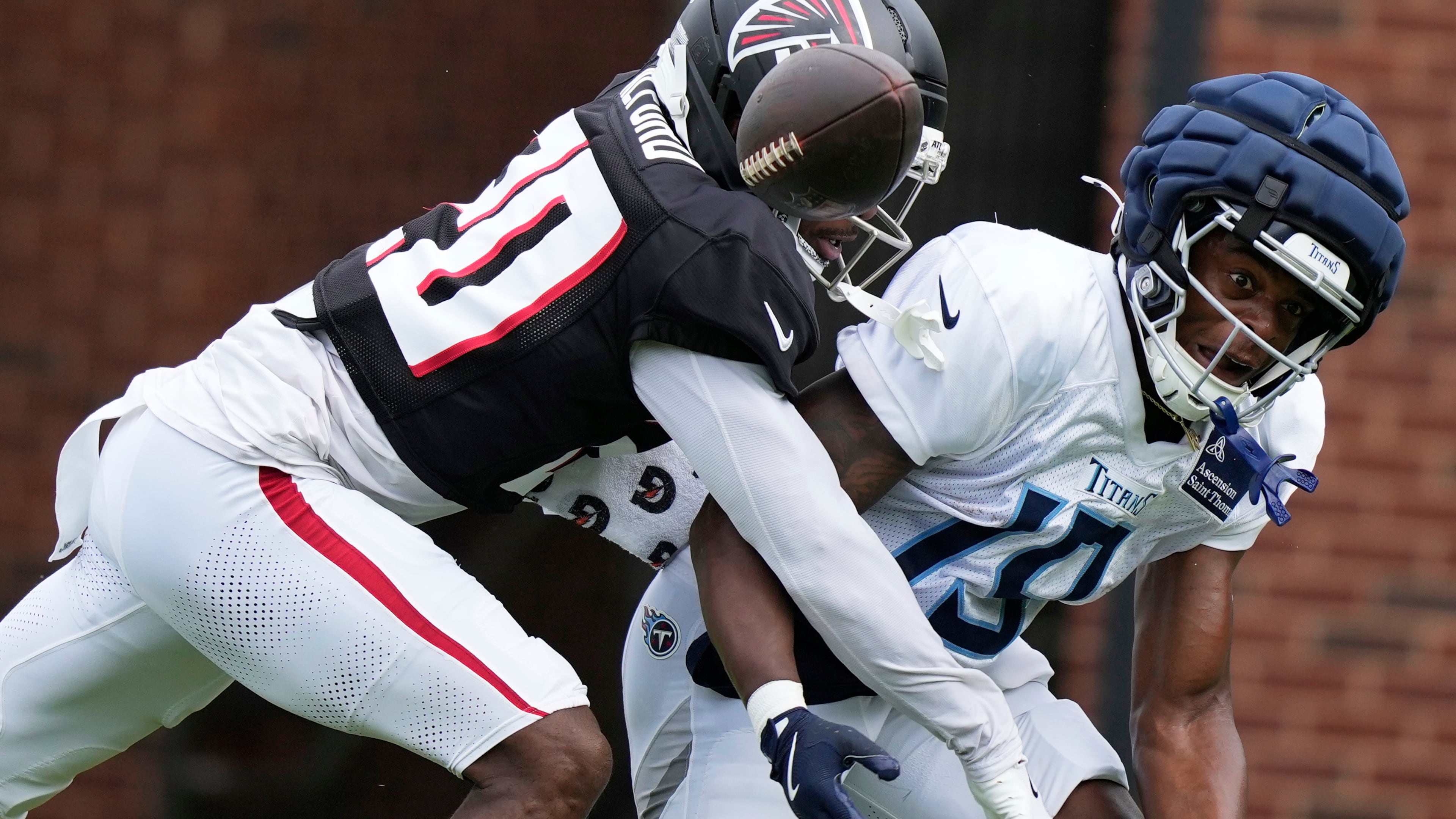 Atlanta Falcons cornerback Dee Alford blocks a pass against Tennessee Titans wide receiver Jha'Quan Jackson during an NFL joint football practice on Tuesday, Aug. 12, 2025, in Flowery Branch, Ga. (Brynn Anderson/AP)