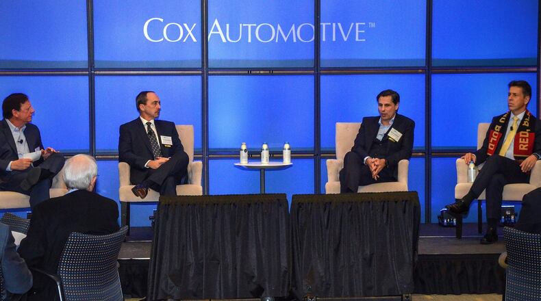 Sponsored by the Atlanta Economics Club, panel members discussed the current state of the auto industry; mobility issues; the impact of the trade wars and how technology is driving the industry. The session was held at the Jim Kennedy Center on the Cox Corporate Campus in Sandy Springs. On-stage speakers are L-R: Sandy Schwartz - Cox Automotive President and CEO, Larry Dominique - Peugeot North America President and CEO, Klaus Zellmer - Porsche USA CEO, Dietmar Exler - Mercedes-Benz USA CEO. Photos taken Monday December 10, 2018 at Cox Corporate Campus in Atlanta, Ga. (Chris Hunt/Special) for AJC Business section story 121118coxautomotive