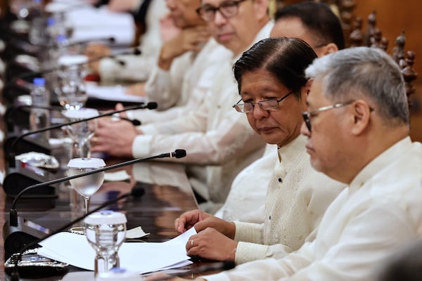 Philippines President Ferdinand Marcos Jr., second right, attends a bilateral meeting with Japan Prime Minister Shigeru Ishiba, not pictured, at Malacanang Palace in Manila, Philippines Tuesday, April 29, 2025. (Rolex Dela Pena/Pool Photo via AP)