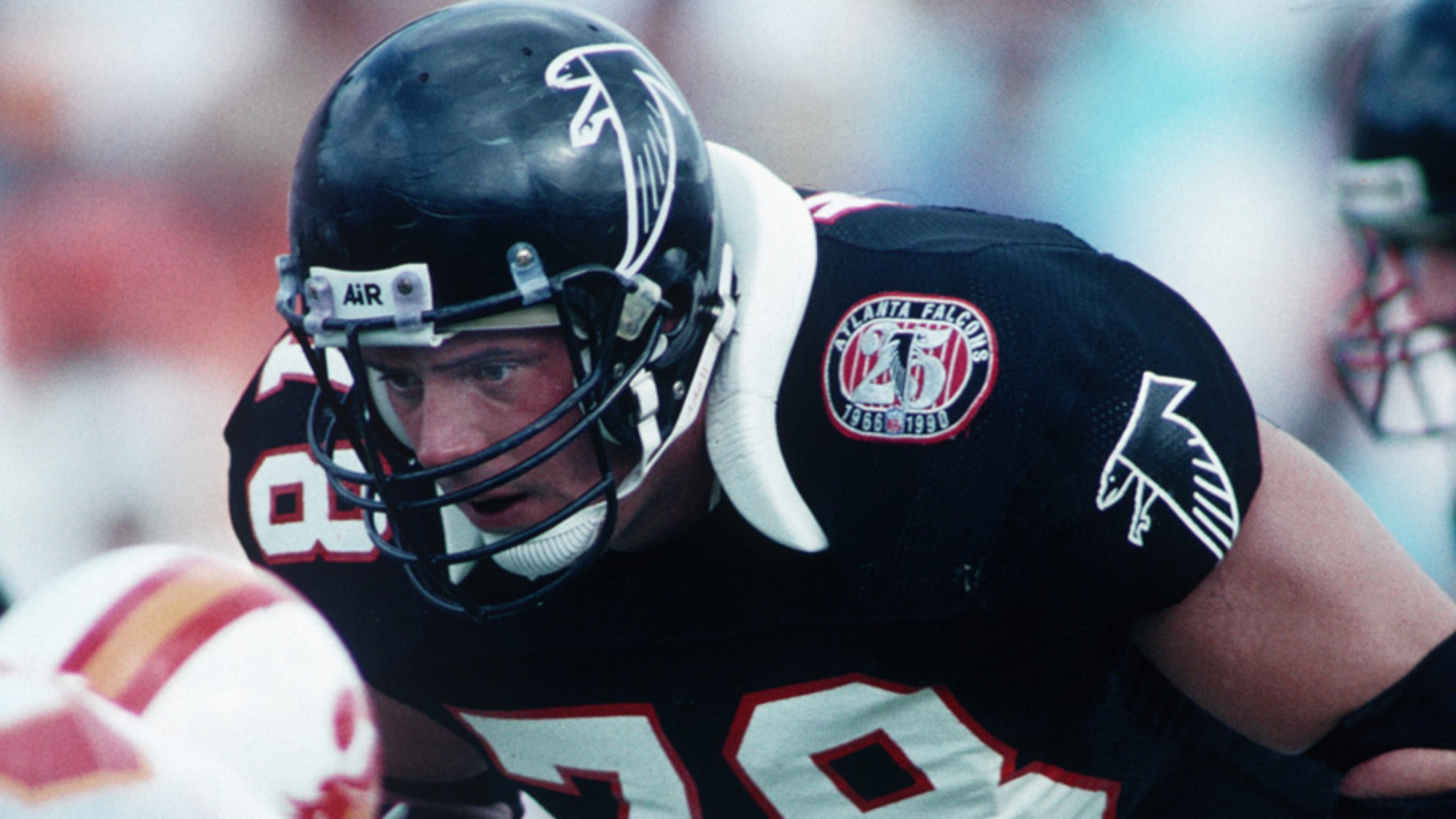 Tackle Mike Kenn (78) of the Atlanta Falcons sets for a play against the Tampa Bay Buccaneers in 1990. (Al Messerschmidt/AP)