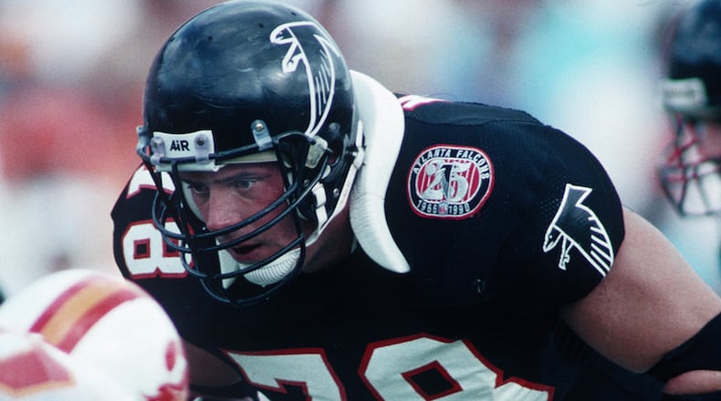 Tackle Mike Kenn (78) of the Atlanta Falcons sets for a play against the Tampa Bay Buccaneers in 1990. (Al Messerschmidt/AP)