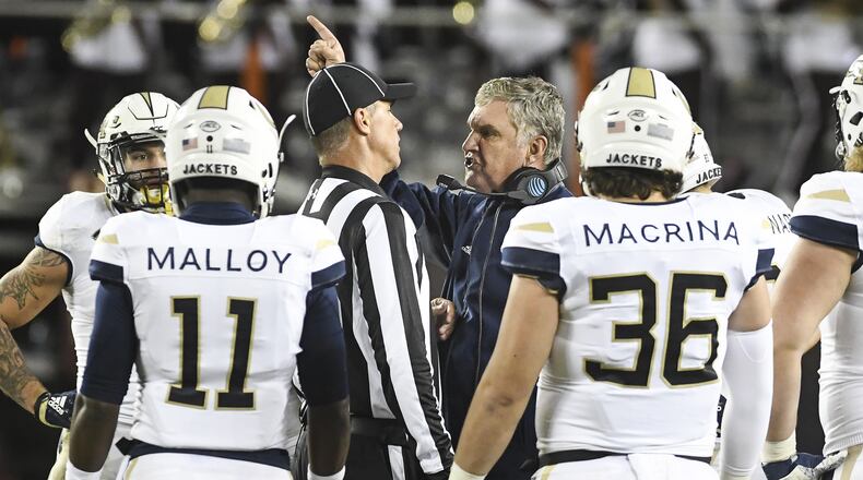 Georgia Tech head coach Paul Johnson speaks to an official during a timeout against the Virginia Tech Hokies in the second half Thursday, Oct. 25, 2018, at Lane Stadium in Blacksburg, Va.