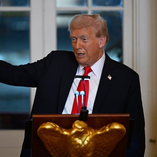 President Donald Trump addresses a dinner for donors who have contributed to build the new ballroom at the White House, Wednesday, Oct. 15, 2025, in Washington. (AP Photo/John McDonnell)