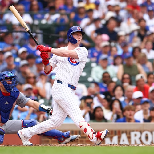 Chicago Cubs designated hitter Pete Crow-Armstrong follows through on an RBI double during the second inning of a baseball game against the Los Angeles Dodgers in Chicago, Wednesday, Aug. 5, 2026. (AP Photo/Jessie Alcheh)