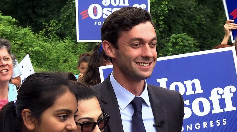 Democrat Jon Ossoff poses for a picture with supporters outside of the East Roswell Library in Roswell, Ga., Tuesday, May 30, 2017. Early voting has begun in the nationally watched special congressional race in Georgia. Ossoff is trying for an upset over Republican Karen Handel in the GOP-leaning 6th Congressional District that stretches across greater Atlanta's northern suburbs. (AP Photo/Alex Sanz)